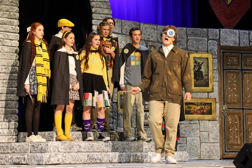 Students perform onstage